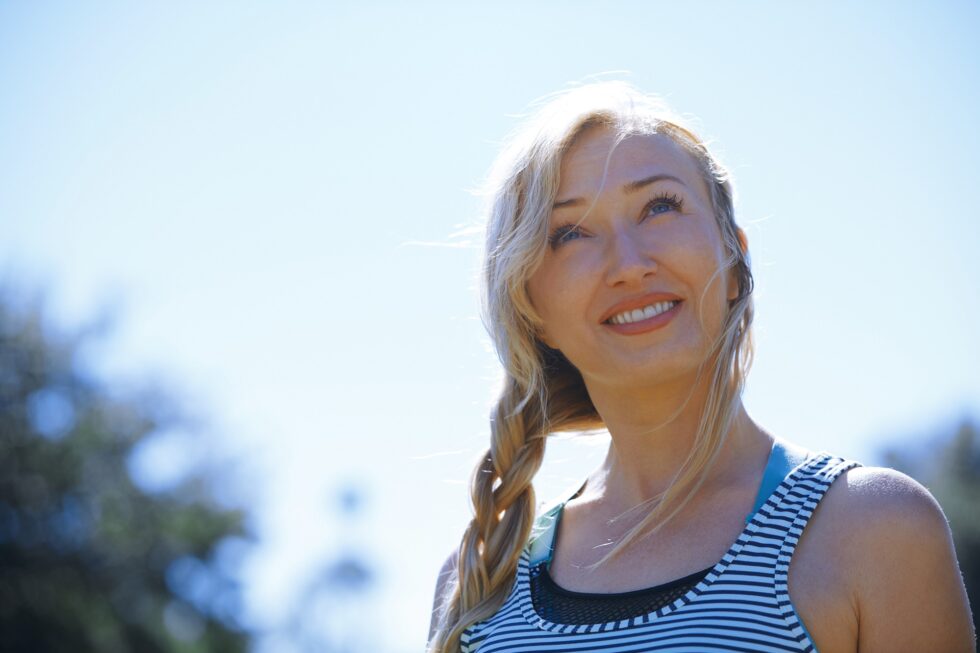 Happy woman enjoying outdoors
